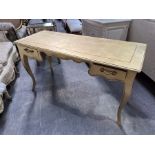 A gilded composite hall/ console table fitted two drawers, shaped apron, raised on cabriole supports
