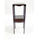 A George III mahogany washstand of small proportions, circa 1820, of square section with a single