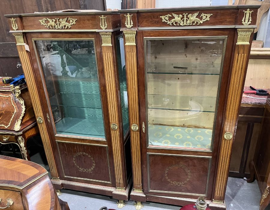 A pair of late 20th century gilt metal mounted vitrines, breakfront form, single glazed door above