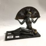 An Art Deco patinated art metal figure of a fan dancer, 22cm high