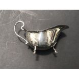 A Gorham silver plated sauce boat, C scroll handle on three shell and stepped feet, 15cm long