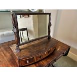 A Regency mahogany toilet mirror, circa 1820, rectangular plate, gilt brass adjustment knobs,