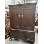 Antique oak cupboard, fitted two doors with carved frieze dated 1615. 125cm wide x 187 high x 51cm