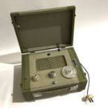 A 1960's portable radio. Note: proceeds to Air Ambulance