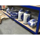 A collection of blue and white transfer printed vessels in the Staffordshire style including tea