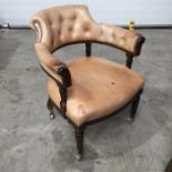 A William IV stained mahogany Captains chair, nude leather buttoned back upholstery, stuff-over