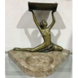 Georges Laurent, an Art Deco silvered bronze figural cigarette holder, modelled as a nude woman