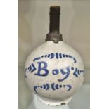 A Delft type blue and white faience bottle, spherical with metal neck, painted Boy, and a green