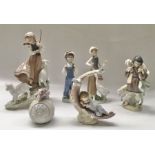 A collection of Lladro figures including Shepherdess No.6964, Goose Girl 1052, Heavenly Slumber, two