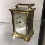 A French gilt brass carriage timepiece