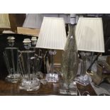 A set of three glass table lamps, Art Deco style, fan form on stepped base, together with a pair