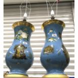 A large pair of reverse painted and printed glass table lamps, 50cm high (2)