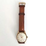 Timor, a gents wristwatch, circa 1960s, silver dial with raised gilt Arabic numerals, subsidiary