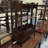 A Mahogany Canterbury bookshelf in the style of Shapland and Petter, book trough over single shelf