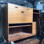 A mid century style teak veneered bureau bookcase