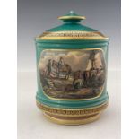 A Prattware tobacco jar and cover, circa 1850, Cylindrical reeded form, The Stone Jetty and The