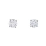 A pair of platinum brilliant-cut diamond single-stone stud earrings, of 1.47ct