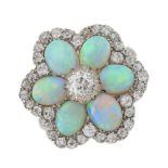 An Edwardian white metal, opal and diamond floral cluster ring