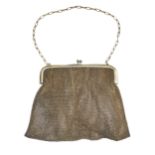 An early 20th century silver mesh purse, with sapphire cabochon acorn clasp