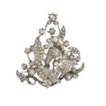 A mid to late 19th century Continental silver and gold, diamond lily floral spray pendant brooch