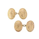 A pair of late Victorian 15ct gold floral engraved cufflinks