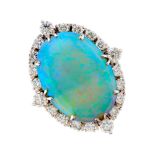 An impressive 18ct gold opal and diamond cluster dress ring