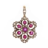 A late Victorian silver and gold, ruby and diamond pendant
