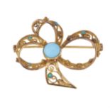 A 19th century gold turquoise bow brooch
