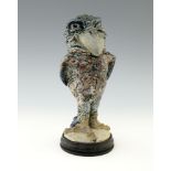 Robert Wallace Martin for Martin Brothers, a stoneware characterful sculptural bird jar and cover,