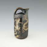 Edwin and Walter Martin for Martin Brothers, a stoneware reptilian jug, 1898, organic square section