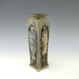 Robert Wallace Martin for Martin Brothers, a relief moulded stoneware bird vase, square section