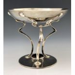 An Arts and Crafts silver pedestal dish, John Round, Sheffield 1904, the shallow bowl on three