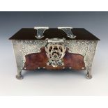 Benjamin Creswick for Heath and Middleton, an Arts and Crafts silver and copper casket, London 1902,