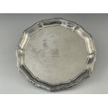 An Edwardian silver salver, Goldsmiths and Silversmiths Company, London 1908, ogee ribbon and reed