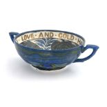 John Pearson, an Arts and Crafts lustre twin handled motto bowl, the interior painted with