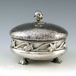 Amy Sandheim, an Arts and Crafts silver box and cover, London 1923, squat bun form, planished,