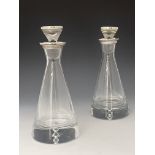 A pair of Elizabeth II silver collared glass decanters, conical form (2)