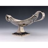 A E Jones for G L Connell, an Arts and Crafts silver twin handled dish, Birmingham 1911, pedestal