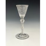 A Jacobite type double knopped air twist wine glass