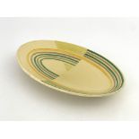 Susie Cooper, an Art Deco plate, 1930s, oval form, painted concentric bands in green, purple and