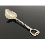 A E Jones, an Arts and Crafts silver spoon, Birmingham 1906