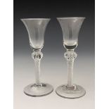 A near pair of airtwist wine glasses