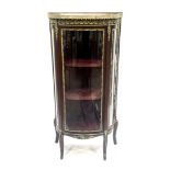 A mahogany vitrine of Louis XVI design, early 20th Century, of bowfront from, pink veined marble