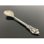 Omar Ramsden, an Arts and Crafts silver spoon, London 1932, planished and cast with a galleon in