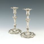 A pair of George II silver candlesticks, William S