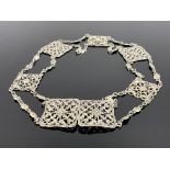 A Victorian silver nurse belt, Lawrence Emanuel, Birmingham 1900, alternating square cast