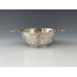 Duchess of Sutherland's Cripples' Guild, an Arts and Crafts twin handled porringer, Birmingham 1913,