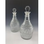 A pair of Anglo Irish cut glass decanters