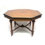 A late Victorian centre table, circa 1870, octagonal satinwood veneered, strung and crossbanded