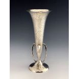 An Arts and Crafts silver vase, Goldsmiths and Silvermiths Company, London 1911, planished, footed